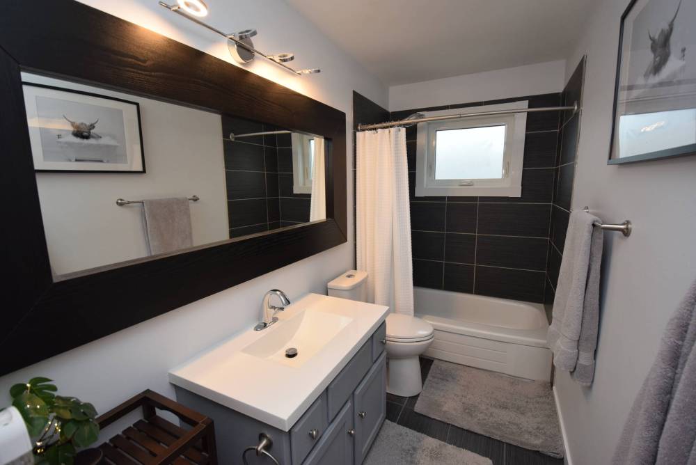The remodelled main bath is as contemporary as they come.