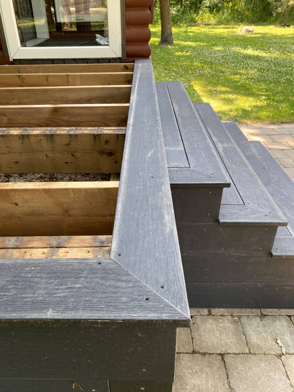 MARC LABOSSIERE / FREE PRESS
Picture-framing composite was installed in preparation for the top-decking boards.