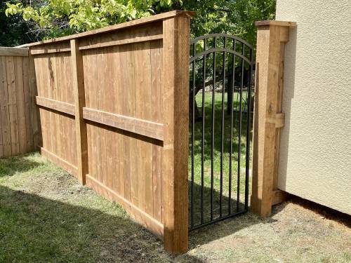 Marc LaBossiere photos
                                The new section of fence was designed to match the existing fence surrounding the neighbours’ property.