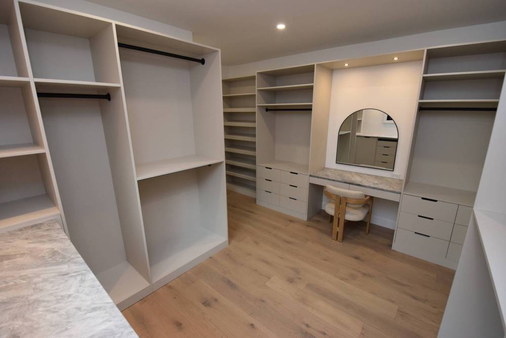 There’s plenty of space to store your wardrobe and get ready for the day in the primary bedroom’s magnificent walk-in closet.