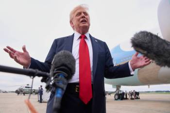 President Donald Trump speaks to the media, Sunday, July 13, 2025, on arrival to Joint Base Andrews, Md., en route to Washington, after attending the Club World Cup final soccer match in New Jersey. (AP Photo/Jacquelyn Martin)