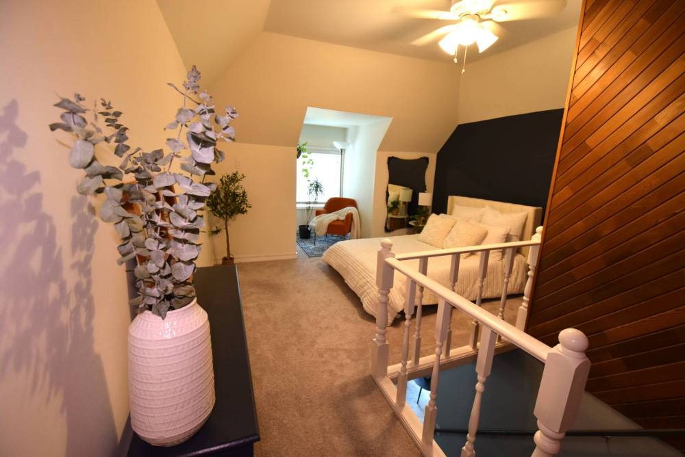 Parents will love the privacy of the loft-style primary bedroom.