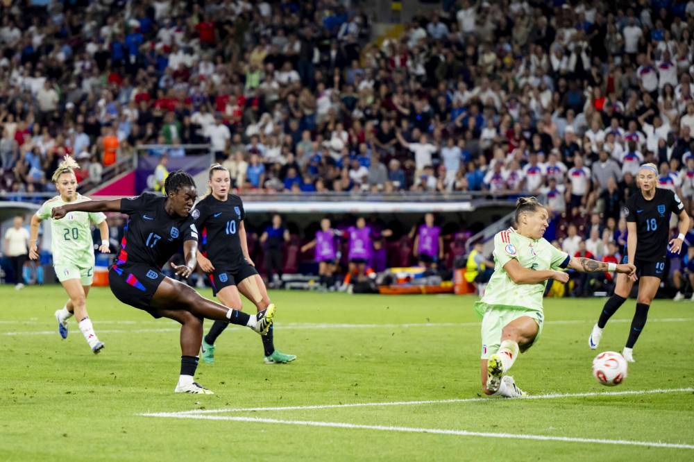 JEAN-CHRISTOPHE BOTT / THE ASSOCIATED PRESS
England’s Michelle Agyemang (17) scored England’s opening goal on Tuesday against Italy. It was Agyemang’s second heroic goal of the tournament.