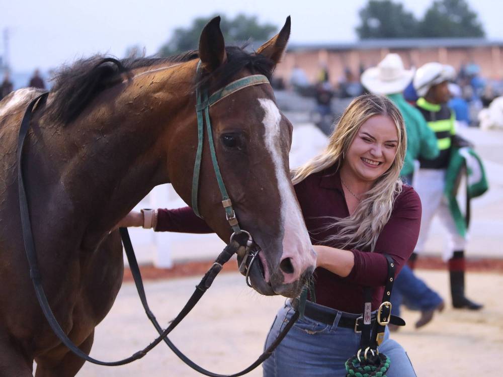 Jason Halstead / Assiniboia Photo
Mike Nault’s assistant trainer/groom Brittany Bergen had a reason to smile after winning the R.C. Anderson Stakes with Twolefttoload.