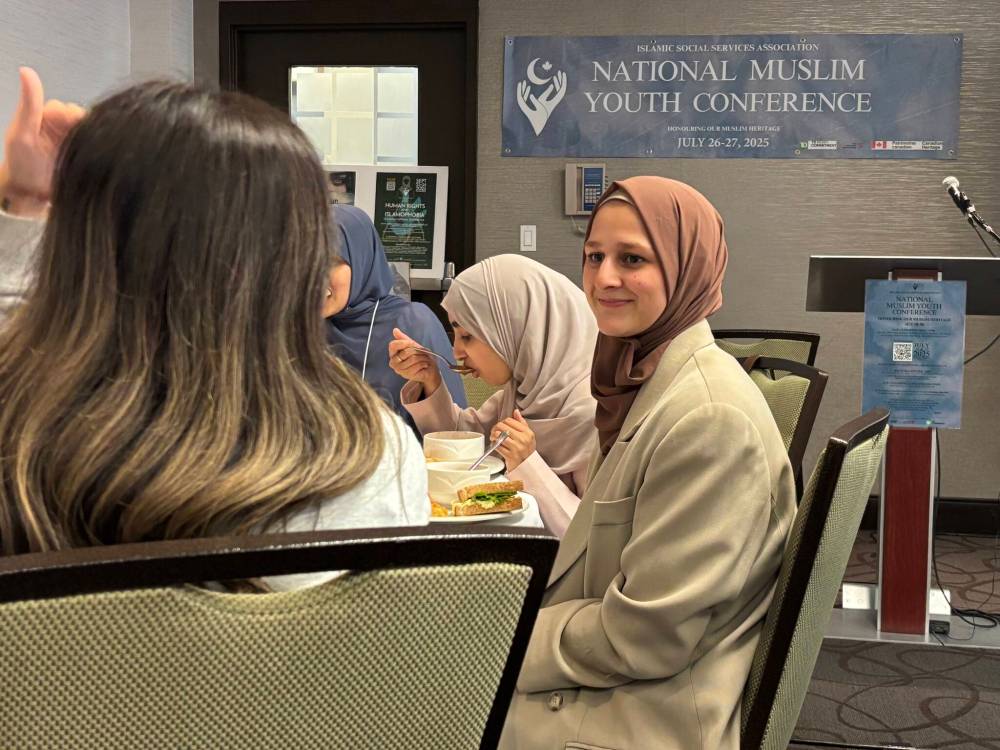 JOHN LONGHURST / FREE PRESS
Winnipegger Ayesha Sultan (right) says the conference was an opportunity to build on ongoing conversations about Islamophobia.