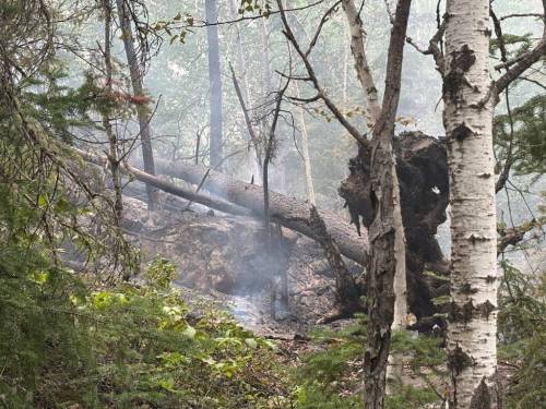 SUPPLIED
                                During a wildfire update Tuesday, the Town of Snow Lake said ground and aerial crews contained several flare-ups, and continued to extinguish hot spots near the town and mining areas.