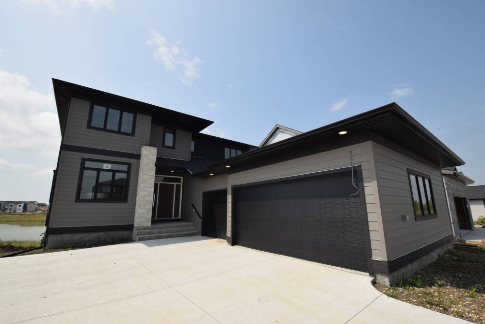 TODD LEWYS / FREE PRESS
With over 3,500 sq. ft. of livable space, the meticulously designed home blends luxury and livability.