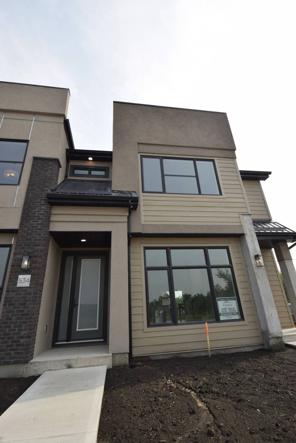 TODD LEWYS / FREE PRESS
This creatively crafted condo is stately, both inside and out.