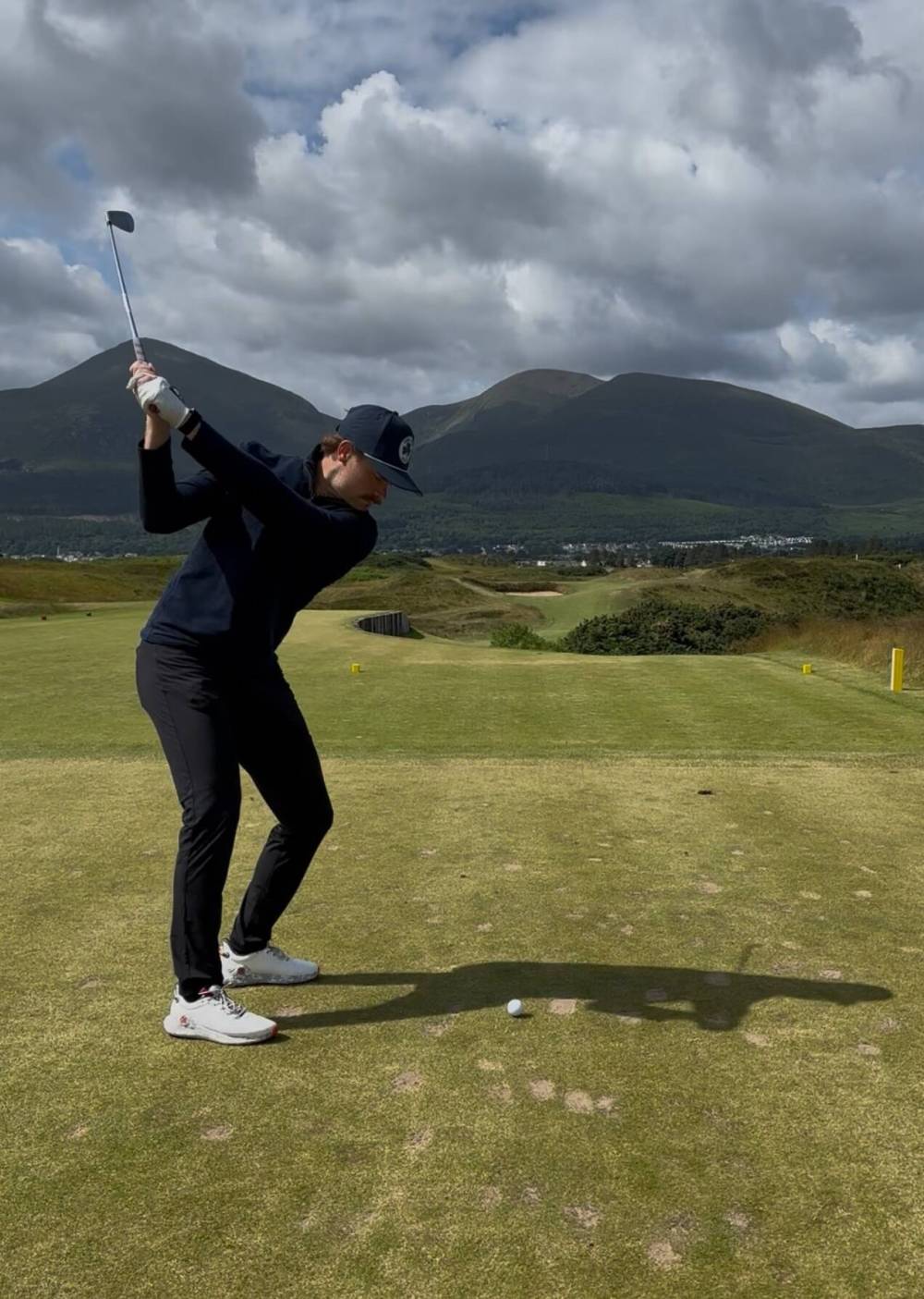 Supplied
Winnipeg Jets goaltender Eric Comrie hits a tee shot at the Royal County Down in Northern Ireland. Comrie will make his Manitoba Open debut next Thursday.