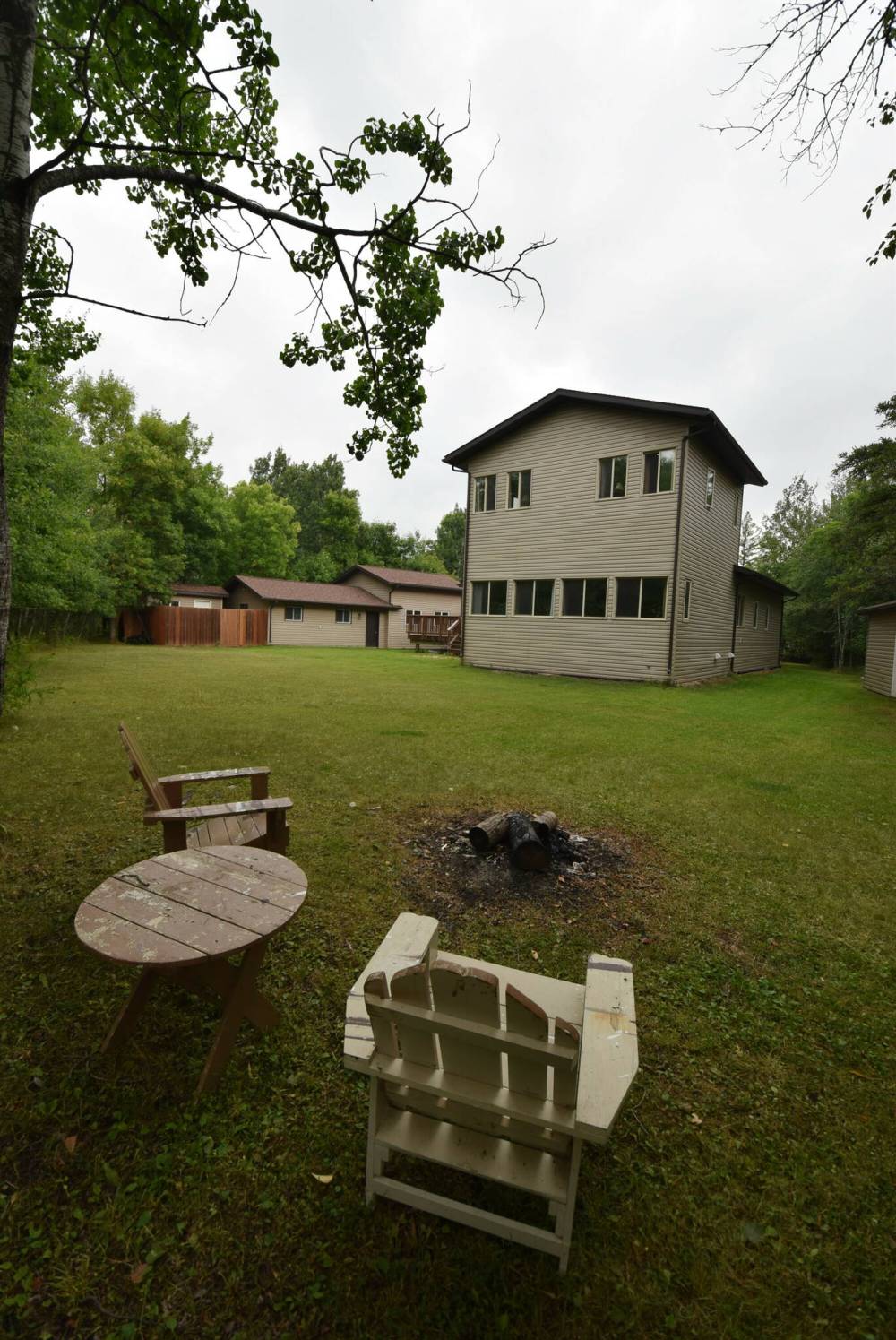 A fire pit area at the rear of the backyard is a great spot to relax at the end of a long day.