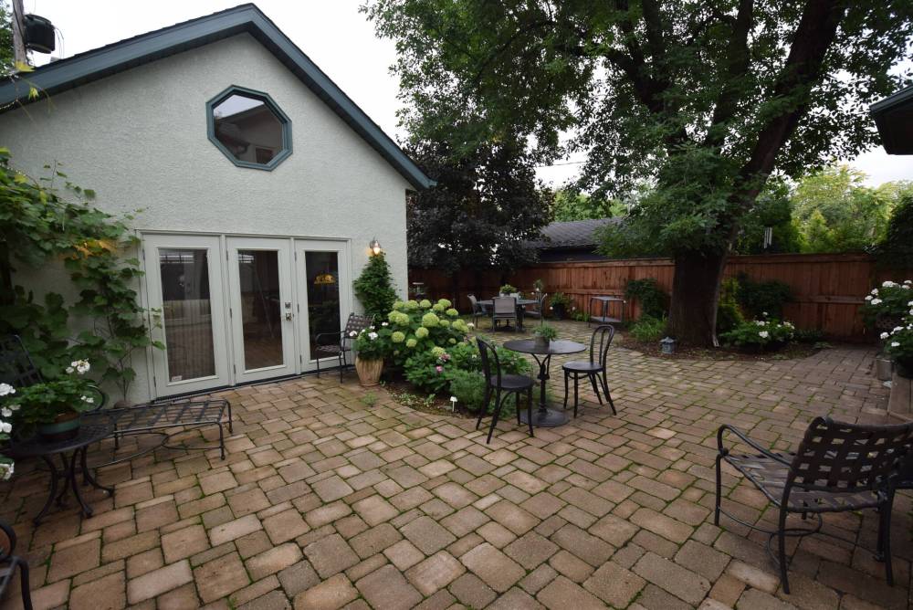 Private and pristine, the backyard is a true, low-maintenance paradise.