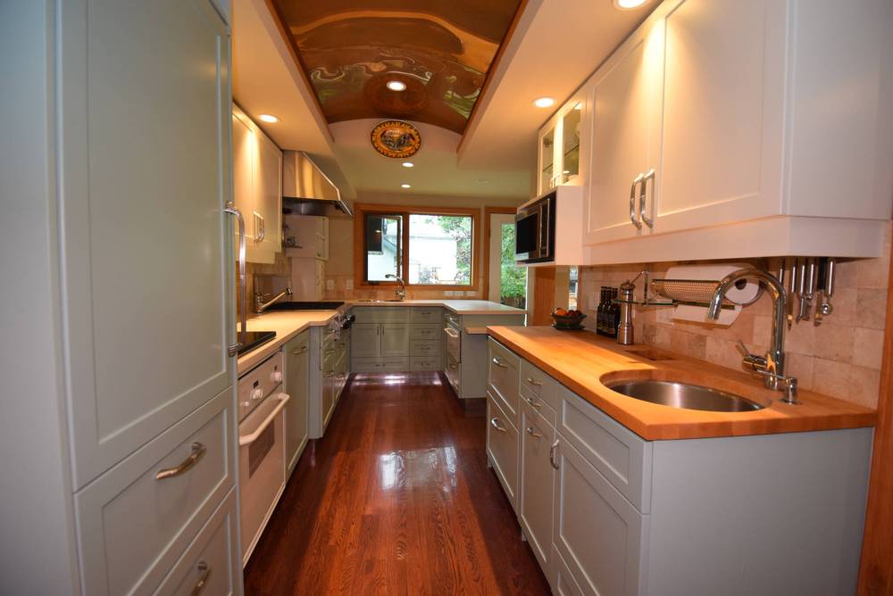 The professionally designed kitchen features an arched copper ceiling, loads of cabinets and many other thoughtful design features.