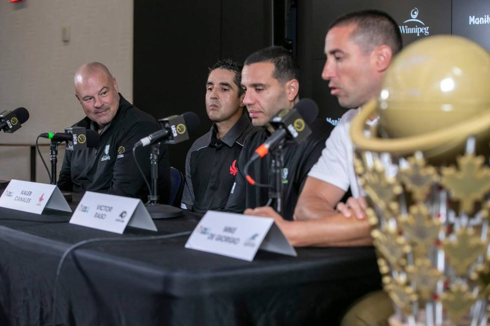 BROOK JONES / FREE PRESS
The remaining CEBL head coaches in the post-season talked playoffs at Canada Life Centre on Wednesday beside the championship trophy. (From left) Winnipeg Sea Bears head coach Mike Taylor, Calgary Surge head coach Kaleb Canales, Niagara River Lions head coach Victor Raso and Scarborough Shooting Stars head coach Mike De Giorgio.