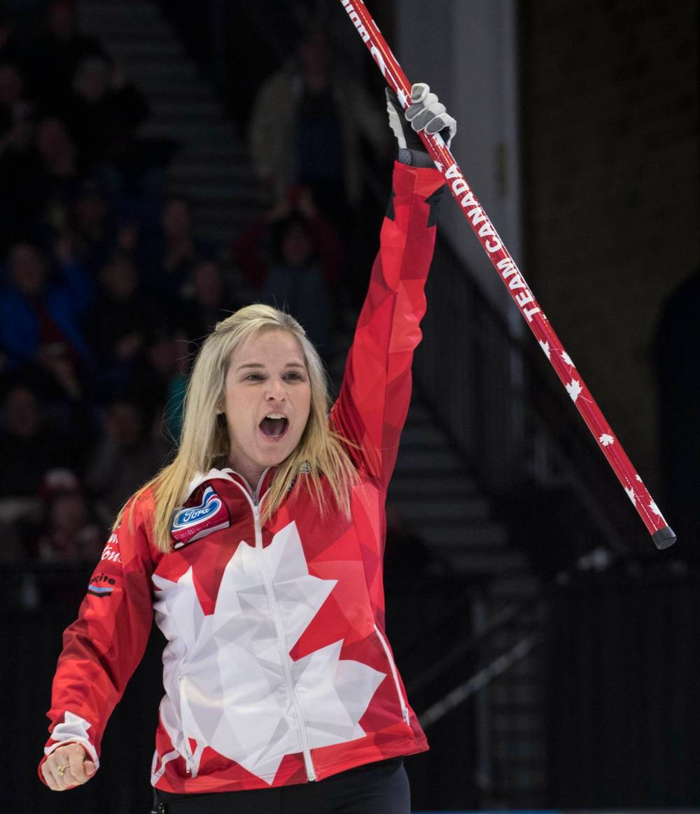 Paul Chiasson / Canadian Press files
In this 2018 photo, Jones celebrates a shot against the U.S. at the World Women’s Curling Championship in North Bay, Ont. Her team would go on to win the championship.