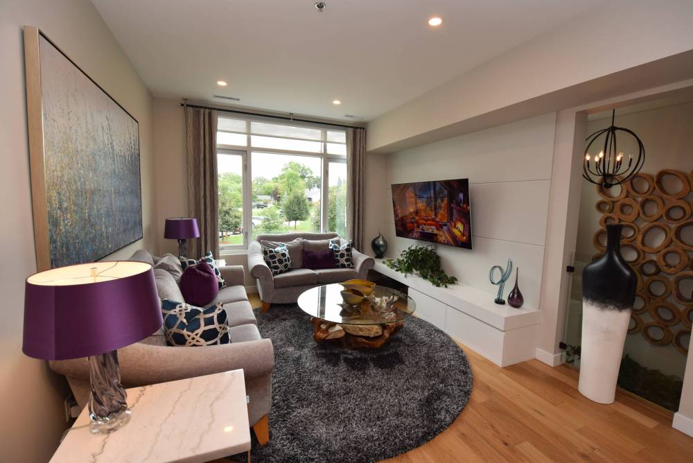 The Great room is made for relaxation and offers a lovely view of mature trees.