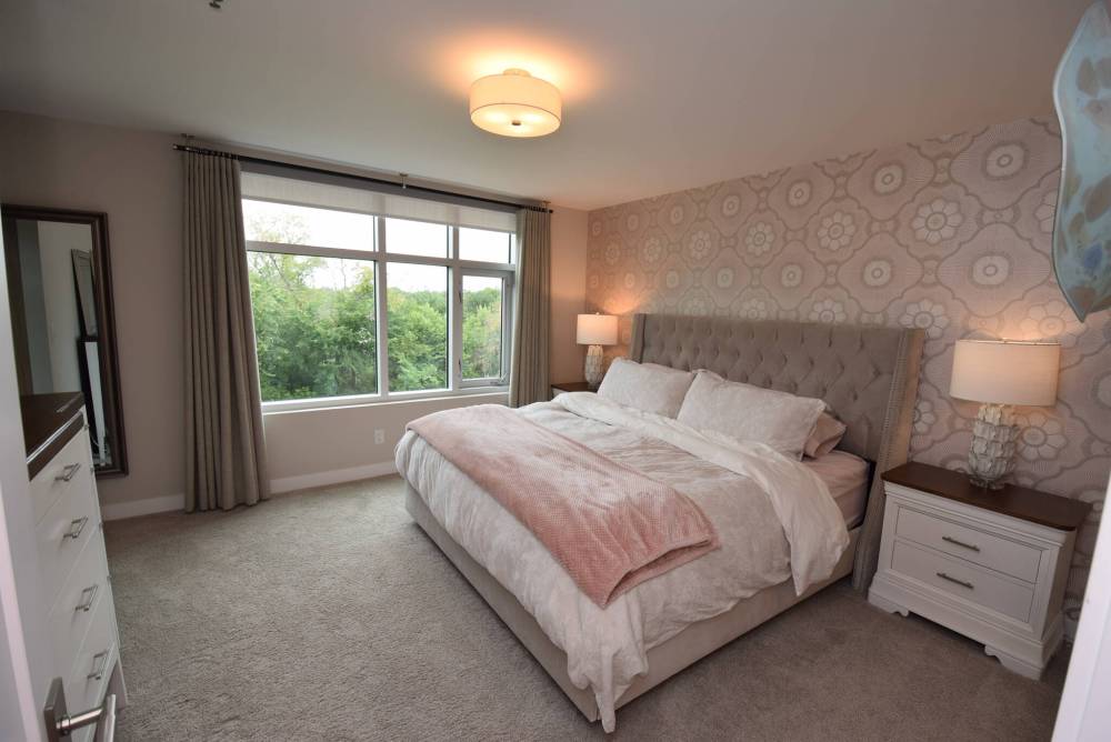 The primary bedroom is a lush sanctuary.