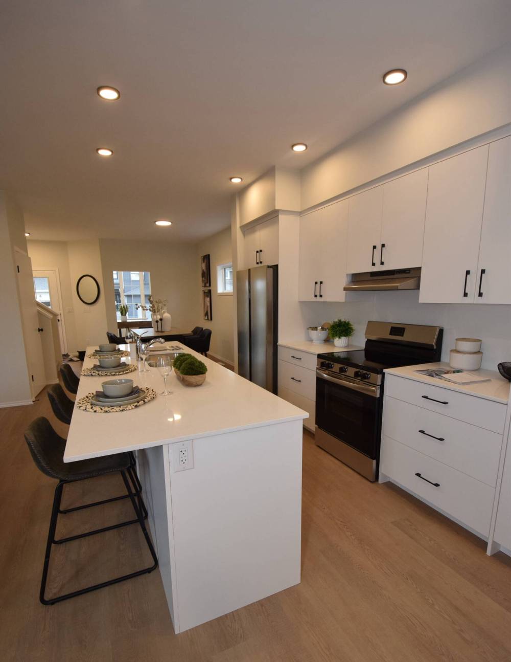 People who love to entertain guests will appreciate the thoughtful placement of the kitchen and dining area at 7 Fireweed Lane in Sage Creek.