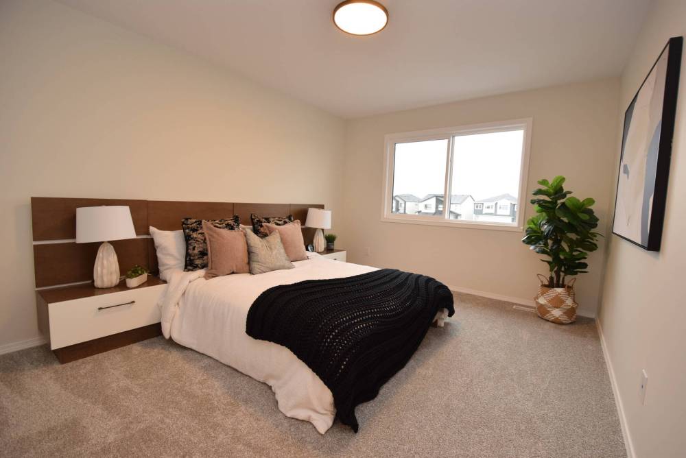 The primary bedroom is an inviting, restful haven.