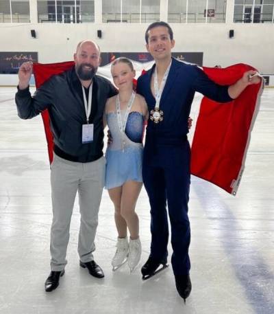 SKATE CANADA INSTAGRAM
                                Winnipeg’s Ava Kemp and Yohnatan Elizarov captured gold in Ankara, Turkey, at the ISU Junior Grand Prix. From left: pairs skating coach Kevin Dawe, pairs skaters Ava Kemp, Yohnatan Elizarov.