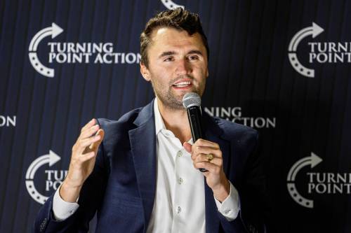 Jeffrey Phelps / Associated Press Files
                                Charlie Kirk, head of Turning Point USA, speaks during a town hall meeting on March 17 in Oconomowoc, Wis. Kirk’s shooting death last week has made him a martyr in MAGA land.