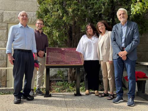 JOHN LONGHURST / FREE PRESS
                                Jewish Heritage Centre of Western Canada program and events committee chairman Daniel Stone (from left), centre president Harlan Abells, Asper Jewish Community Campus board president Jill Winograd, centre executive director Belle Jarniewski and centre staff member Stan Carbonne after a plaque honouring Rabbi Israel Isaac Kahanovitch was unveiled Sunday.