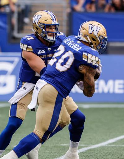 John Woods / THE CANADIAN PRESS FILES
                                Winnipeg Blue Bombers quarterback Chris Streveler (left) has 10 interceptions so far this season, but teammate Brady Oliveira (right) and head coach Mike O’Shea say you can’t pin turnovers solely on QBs.
