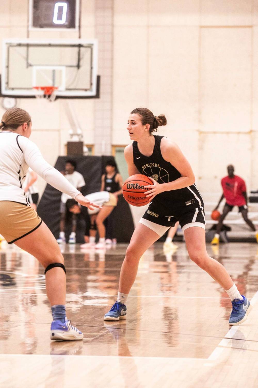 MIKAELA MACKENZIE / FREE PRESS
Helping coach a Prairie Elite Basketball League team this summer inspired Kyu Fust to get back onto the court.