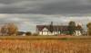 RUTH BONNEVILLE / FREE PRESS FILES
                                A stretch of Mollard Road, which is home to the Sikh Society of Manitoba building at 1244 Mollard Rd, has been paved.
