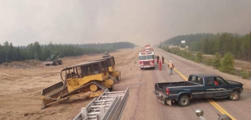 Government of Manitoba
                                Scene from a Leaf Rapids wildfire in July. Residents of the town can begin returning home Monday after more than two months away owing to wildfires.