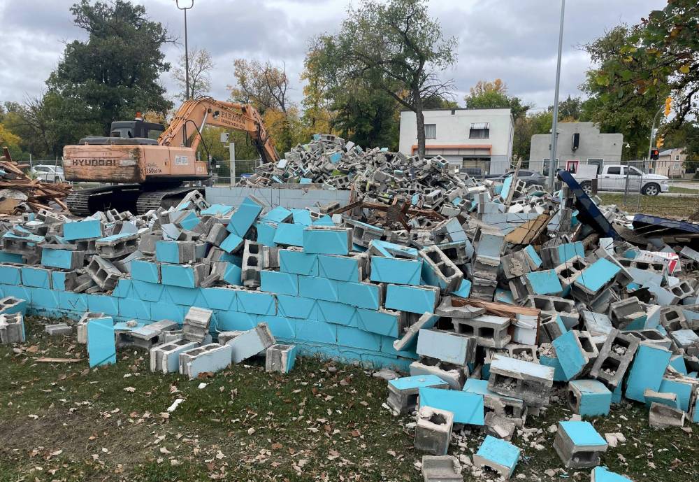 Ruth Bonneville / Free Press
Crews work on demolishing Happyland outdoor pool on Marion Street, Thursday. In an attempt to convince city council to keep the pool open for another season, area residents raised $86,000 last year to go toward the pool’s operating costs. Instead, council cast a final vote to close the facility.