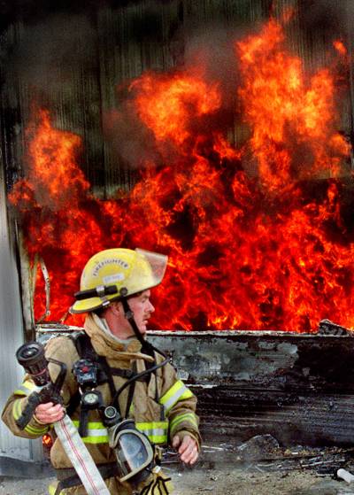 JOE BRYKSA/FREE PRESS FILES
                                The City of Winnipeg city operates 40 fire-rescue units out of 27 stations and has 167 firefighters on duty, which the United Firefighters of Winnipeg says is less than it was in 1975.