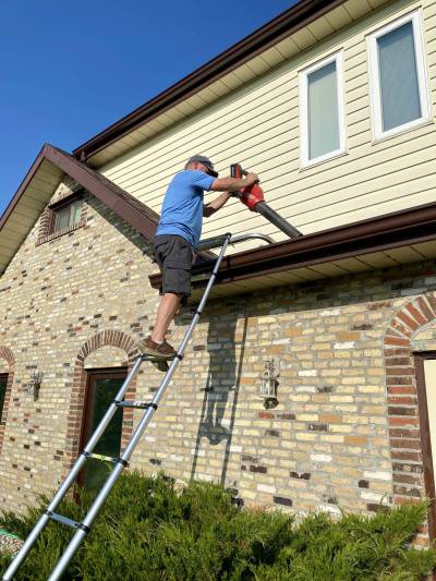 The gutters are cleared of any asphalt granules so that we can monitor the shingles’ condition over the years following the Gonano application process.