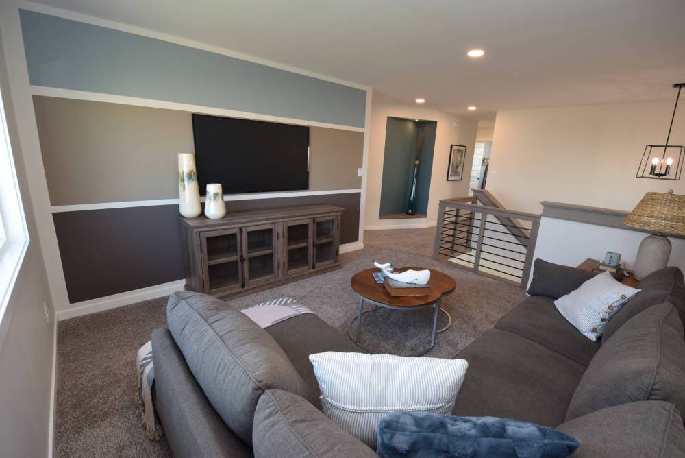 TODD LEWYS / FREE PRESS
Kids will gravitate to the second-floor loft, where they can watch TV or game to their heart’s content.
