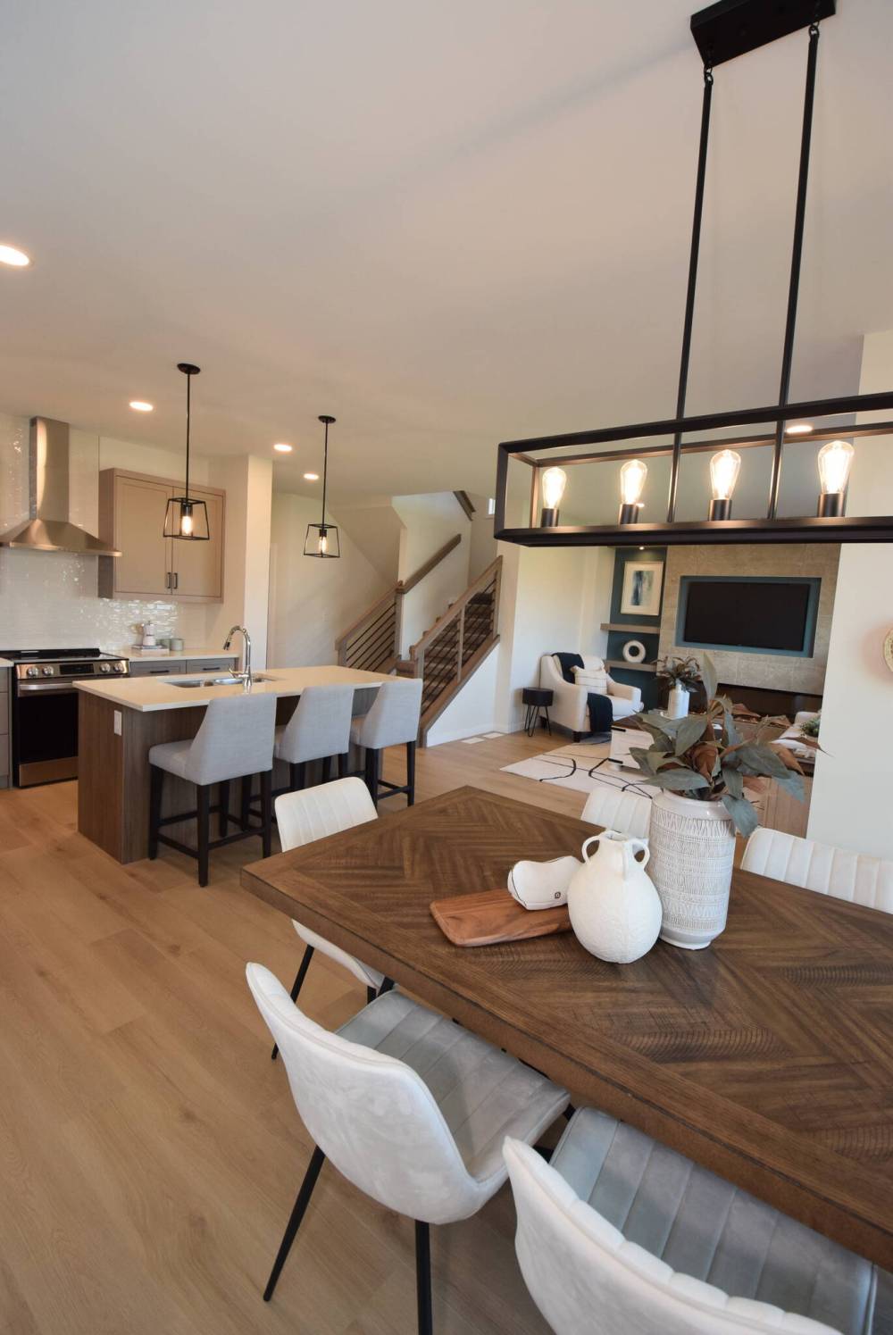 TODD LEWYS / FREE PRESS
The view from the dining area showcases the seamless flow of the main living space in this show home at 109 Mill Rock Rd., Highland Pointe.
