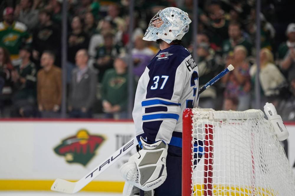 ABBIE PARR / THE ASSOCIATED PRESS
Jets goalie Connor Hellebuyck made his pre-season debut against the Wild on Wednesday night in St. Paul, Minn.