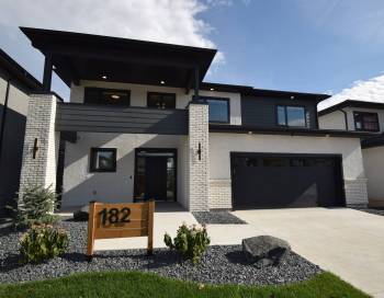 Just one year old, this 2,101 sq. ft. two-storey home features luxurious finishes throughout.