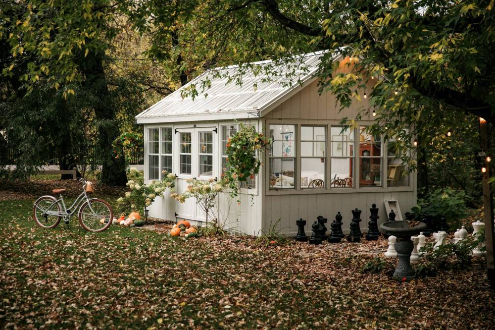Robyn Chubey photos
                                Robyn Chubey uses pumpkins to create a welcoming entrance to her greenhouse.