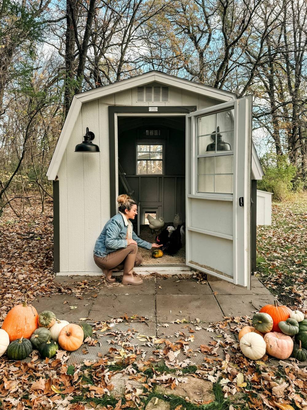 Robyn Chubey and her new chicken coop. Soon, she’ll have colourful home-raised eggs.