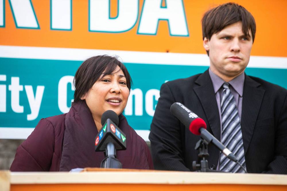 MIKAELA MACKENZIE / FREE PRESS
Chris Sweryda announces his candidacy for Elmwood-East Kildonan city councillor with Sarah Schreyer, wife of the late Elmwood-East Kildonan councillor Jason Schreyer, on Thursday.