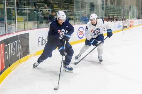 MIKE DEAL / FREE PRESS FILES
                                Winnipeg Jets’ Mark Scheifele (55) and Colin Miller (6) during training camp last month.