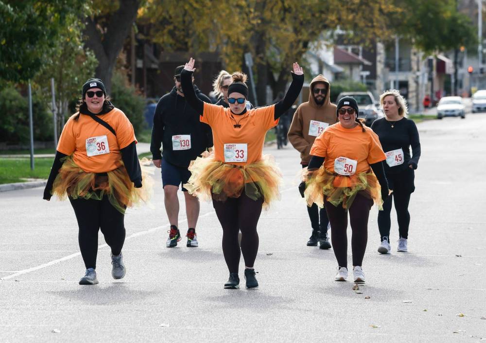 JOHN WOODS / FREE PRESS Runners Kayla, from left, Kayla and Vickey take part in the Turkey Trot 5km in Winnipeg Monday, October 13, 2025. Reporter: standup
