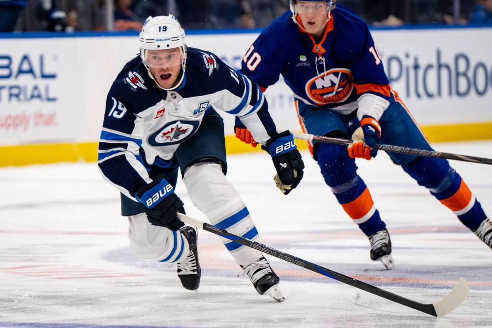 Angelina Katsanis / THE ASSOCIATED PRESS
Winnipeg Jets centre Jonathan Toews (left) picked up his first point since April 2023 during Monday’s road win over the New York Islanders. Toews is already making an impact in the face-off circle, currently sitting at a 62.3 per cent win rate in the early season.