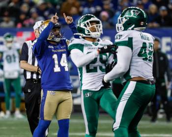 John Woods / THE CANADIAN PRESS
                                Blue Bombers kicker Sergio Castillo (left) celebrates his game-winning field goal Friday against the Saskatchewan Roughriders.