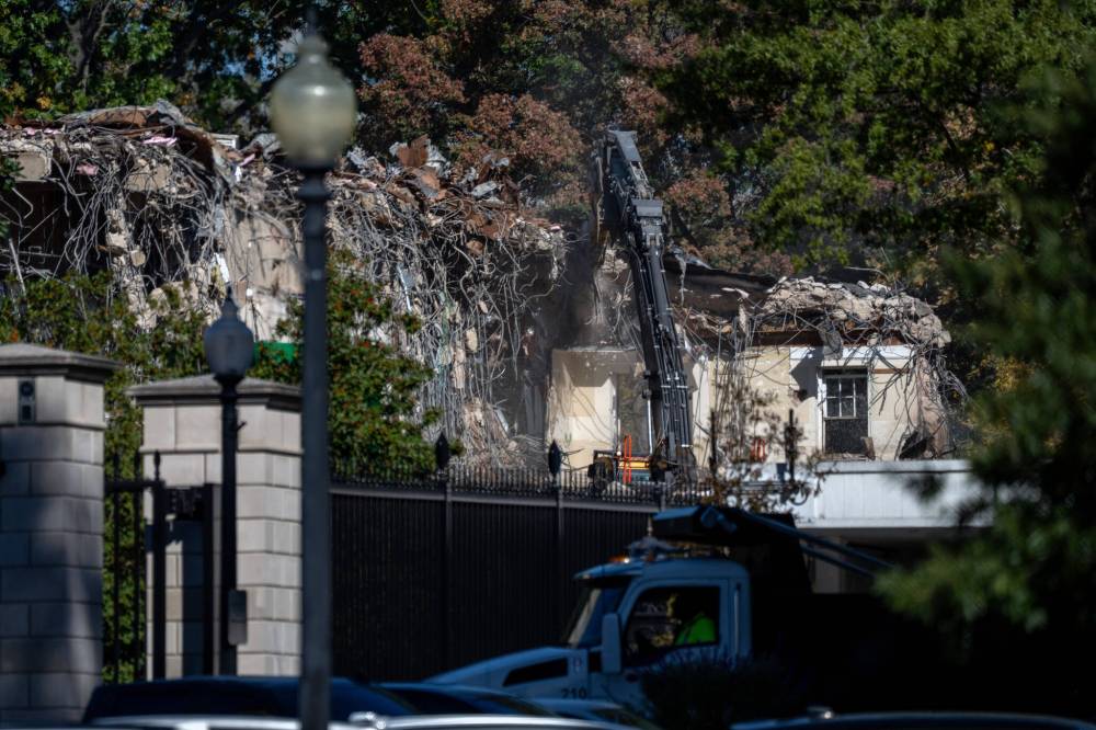 The Washington Post
                                Demolition crews continue dismantling parts of the East Wing of the White House on Wednesday.
