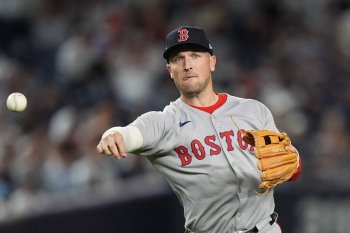 FILE - Boston Red Sox shortstop Trevor Story (10) throws during the fourth inning of Game 2 of an American League wild-card baseball playoff series, Oct. 1, 2025, in New York. (AP Photo/Frank Franklin II, File)