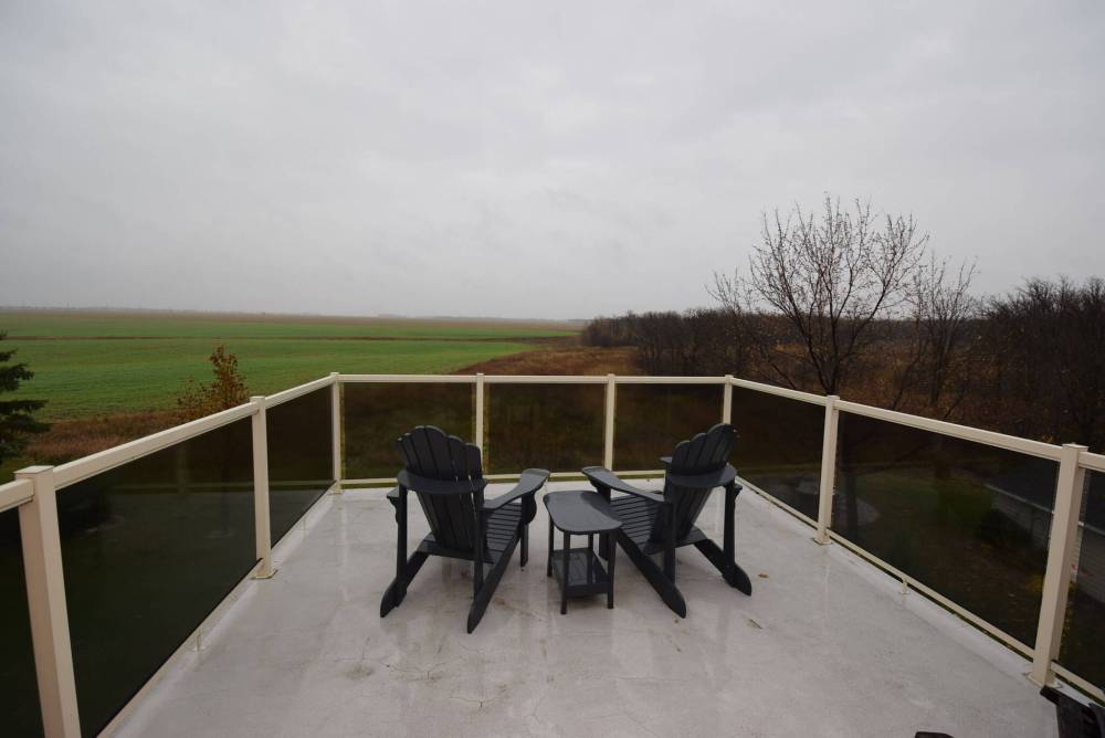 Todd Lewys / Free Press
Even on a dreary day, the countryside view from the primary bedroom’s elevated balcony is amazing.