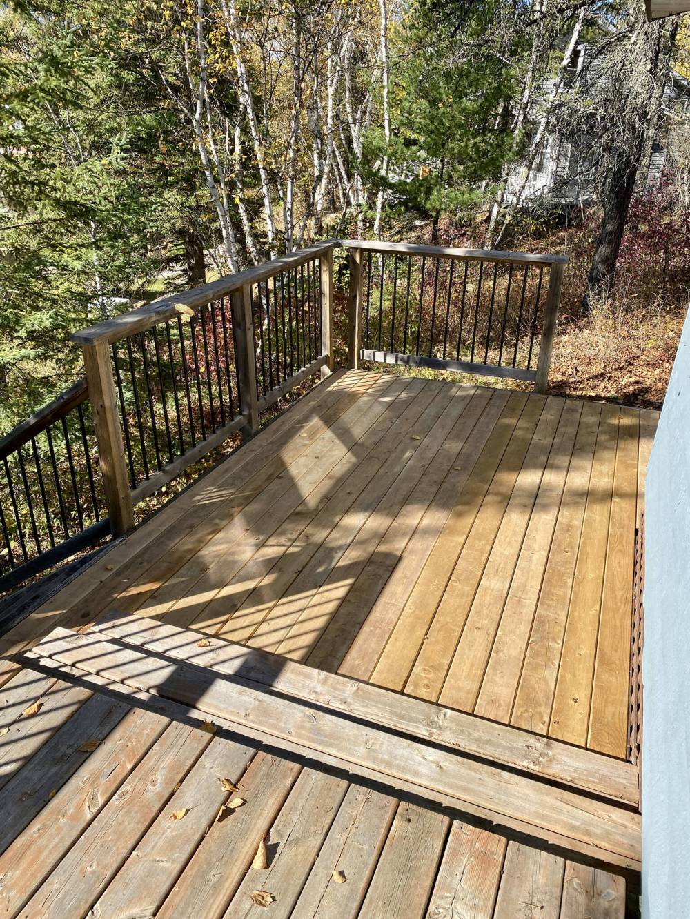 MARC LABOSSIERE / FREE PRESS
The lower porch tier at the cottage only accessible by boat received new top decking on a beautiful autumn day.