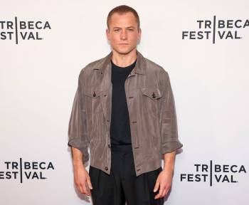 Andy Kropa / Invision Files
                                Taron Egerton