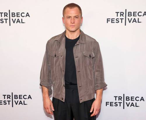 Andy Kropa / Invision Files
                                Taron Egerton