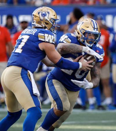 JOHN WOODS / THE CANADIAN PRESS FILES
                                Winnipeg Blue Bombers running back Brady Oliveira (right) said Tuesday he has nothing but good things to say about playing for his hometown club, but that he owes it to himself to find the best place to win another Grey Cup.